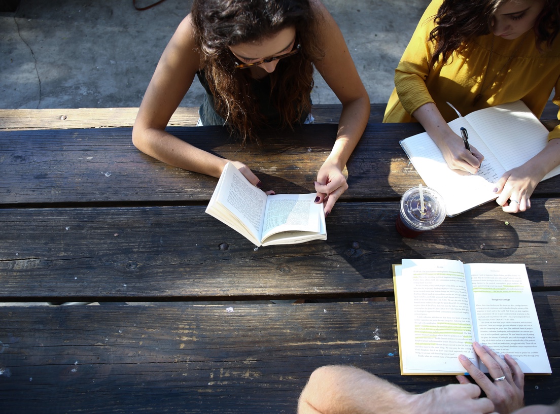 picture of students learning at table