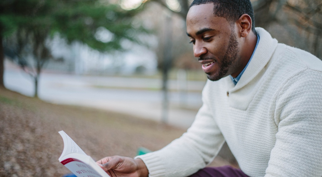 Close-up of a man reading